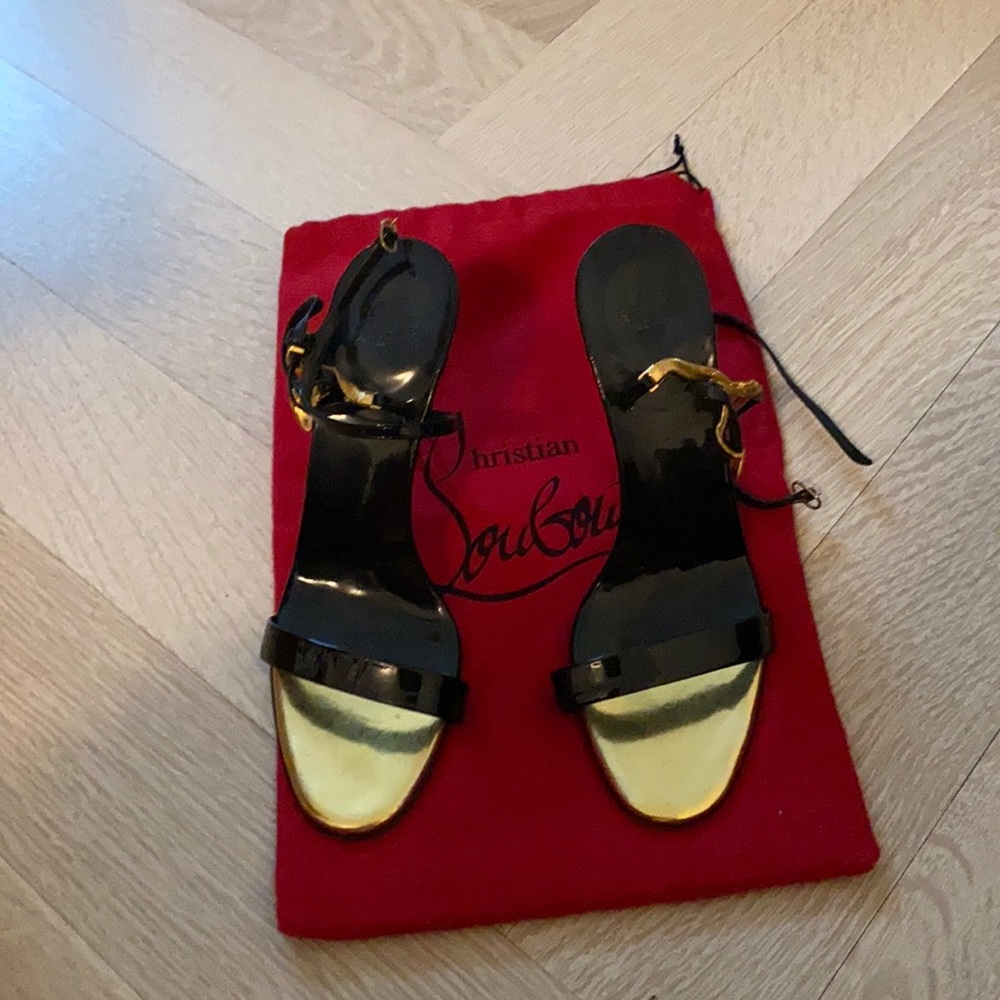 Gently used Christian Louboutin strappy sandals